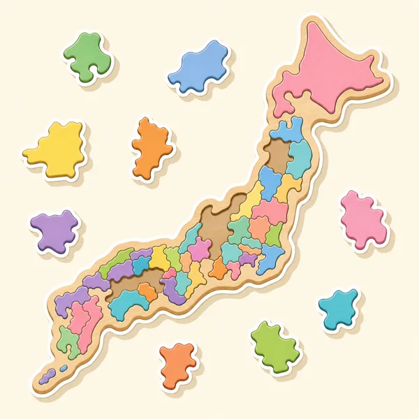 木製の日本地図パズルのイラスト。都道府県の形のピースが外れて浮いている